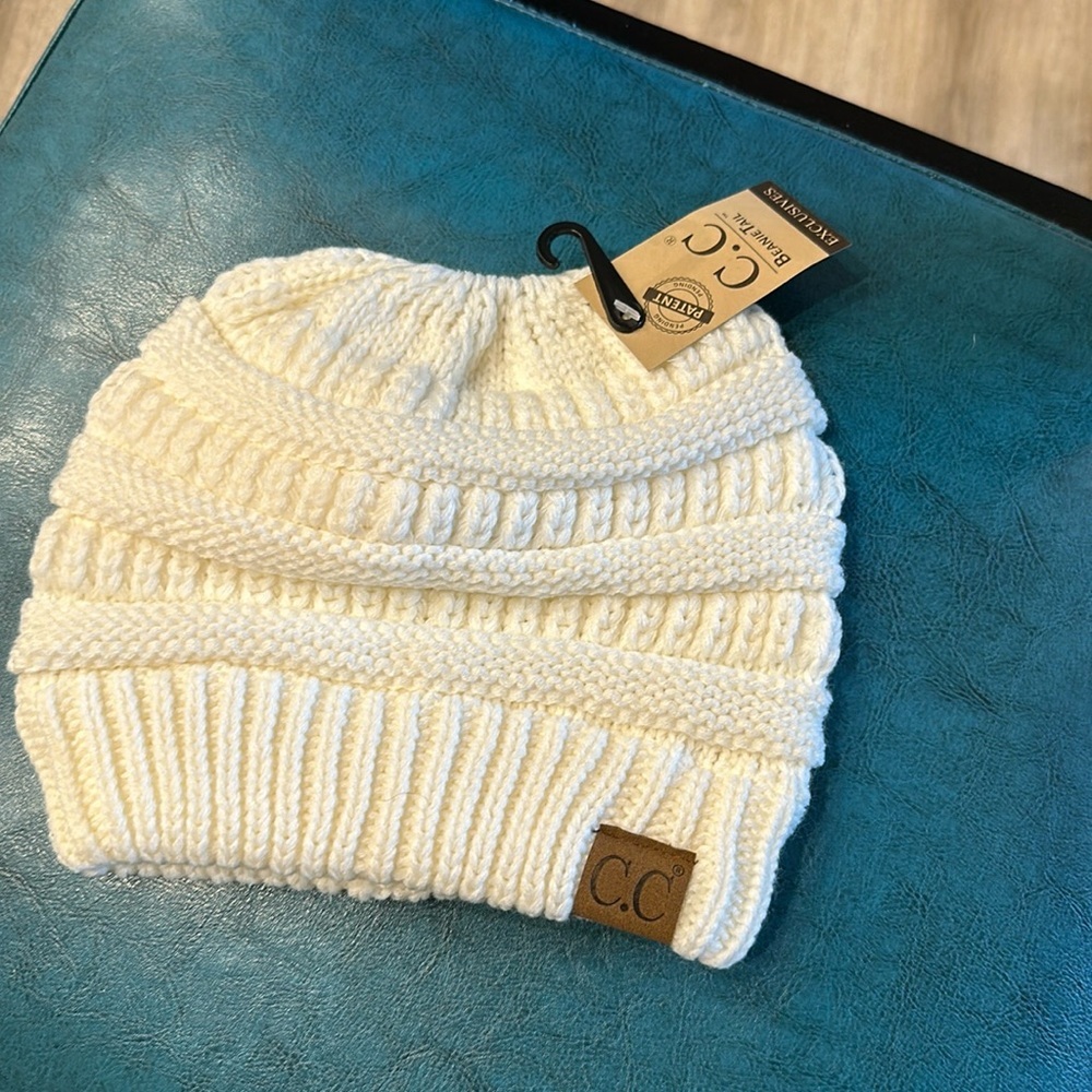 - NWT CC BeanieTail color ivory